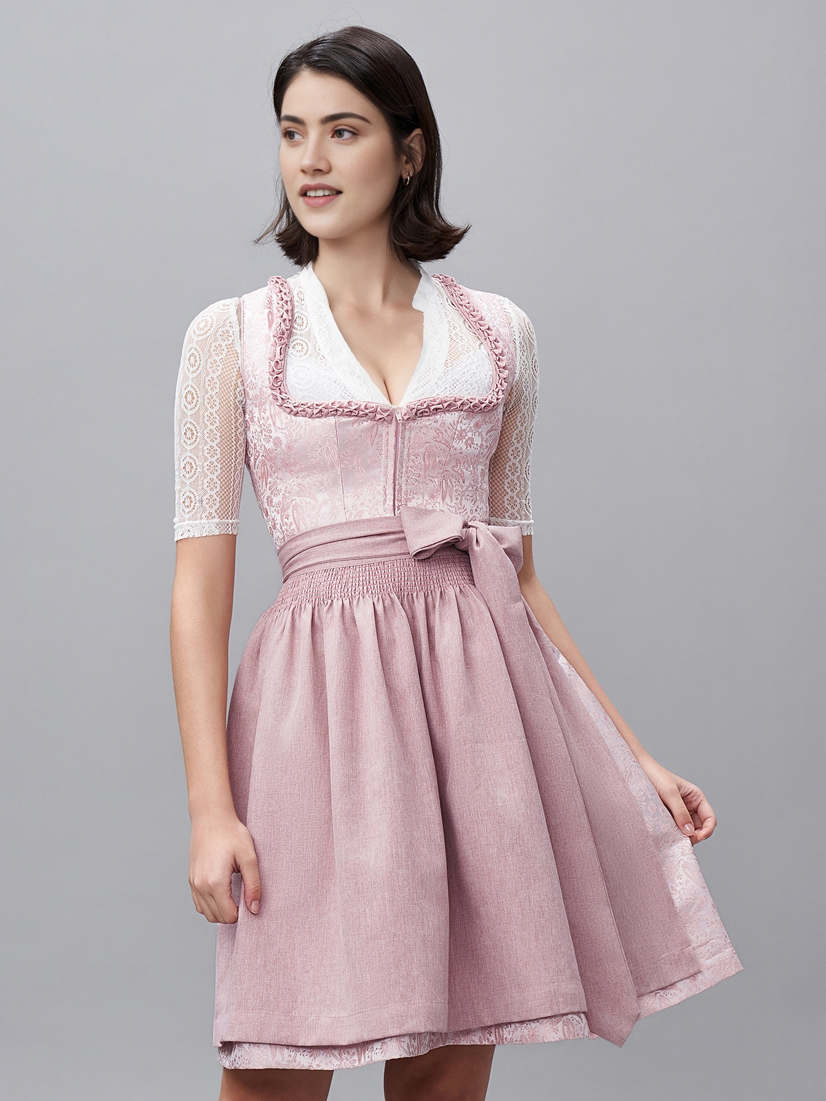 Beige Samt-Dirndl mit rosa Schürze
