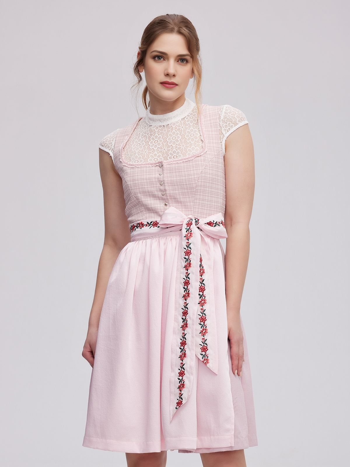 Modernes rosa Dirndl mit raffiniertem Schnitt